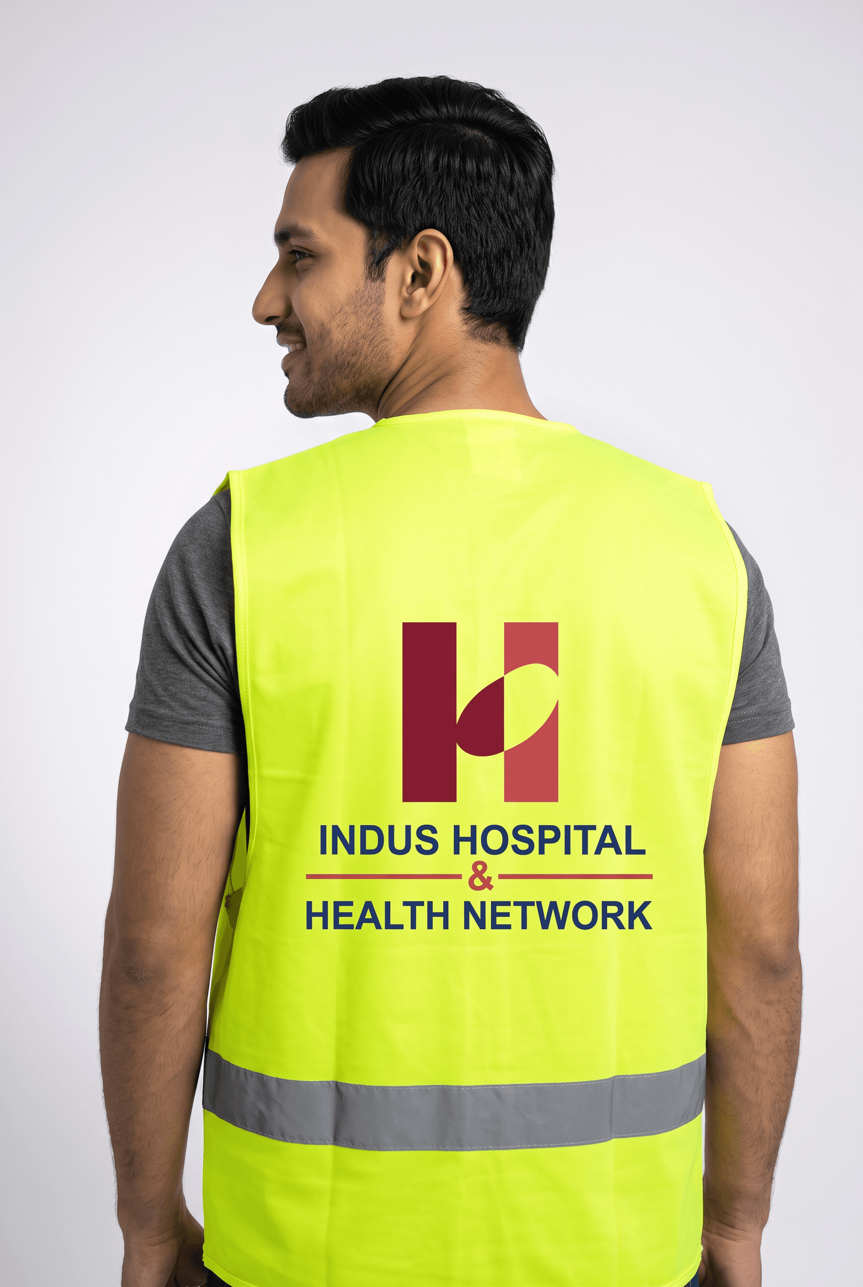 Reflective hi-vis safety vest with printed back branding, manufactured in Karachi