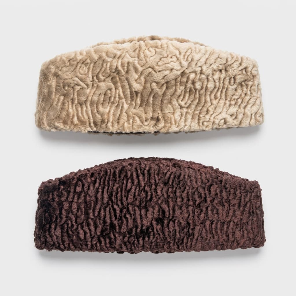 Karakul Jinnah caps in cream and maroon curled wool