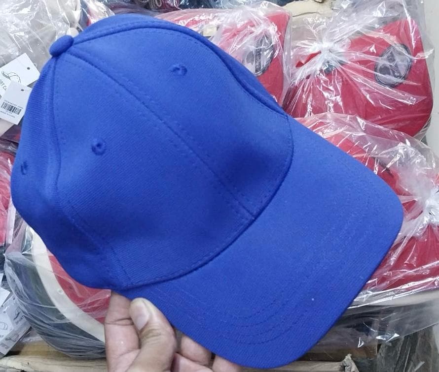 Bulk plain baseball caps in stock for wholesale supply in Karachi