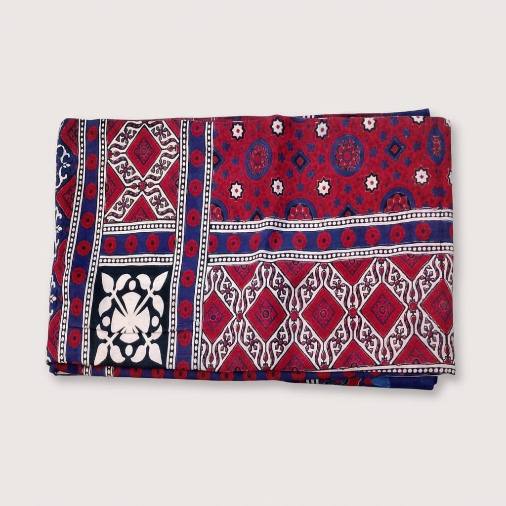 Folded Ajrak in red and blue traditional block print
