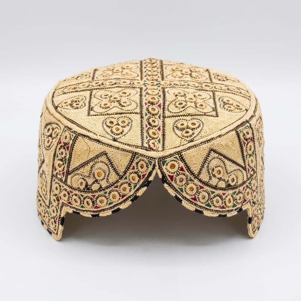 Cream Sindhi topi with dense gold thread embroidery